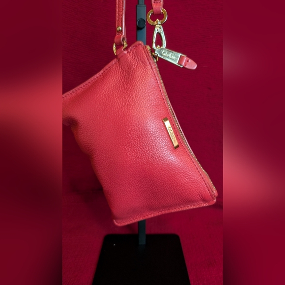 Cole Haan Coral Leather Wristlet with Gold Accents - Picture 1 of 9